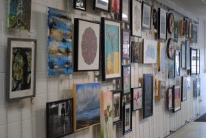 40ft Chain wall to display local artwork for sale
