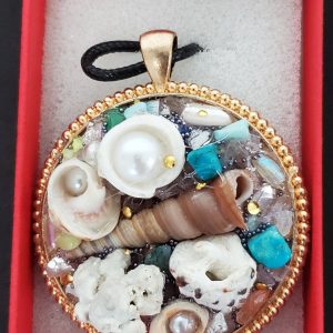 Pendant of Many Seashells by Theresa Moleski